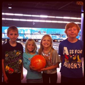 The kiddos bowling last summer at Stars and Strikes.
